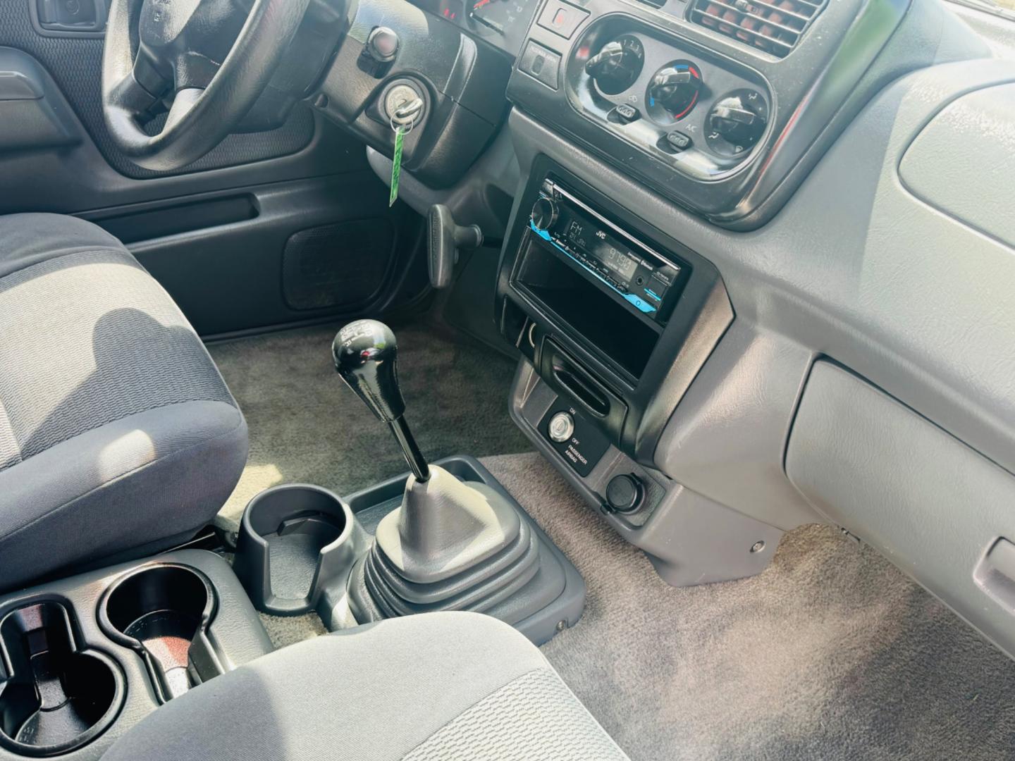 2001 Blue Nissan Frontier (1N6DD26S41C) , located at 2190 Hwy 95, Bullhead City, AZ, 86442, (928) 704-0060, 0.000000, 0.000000 - 2001 Nissan frontier xe king cab. 4 cylinder. 142k miles. Manual . Ice cold ac. Lots of extras done to truck . New tires new radiator. Fully serviced. New clutch, new brakes, pads. Runs and drives great. Financing available. In house financing .buy here pay here - Photo#10